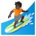 🏄🏿 person surfing: dark skin tone display on Google